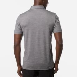 TravisMathew The Heater Golf Polo Shirt Black 11 TravisMathew The Heater Golf Polo Shirt Black -Fairway Elite Sales Store Travis Mathew SS21 The Heater Golf Polo Shirt 1MW395 Code SHTRA037 M Sleet Quit Shade model 3